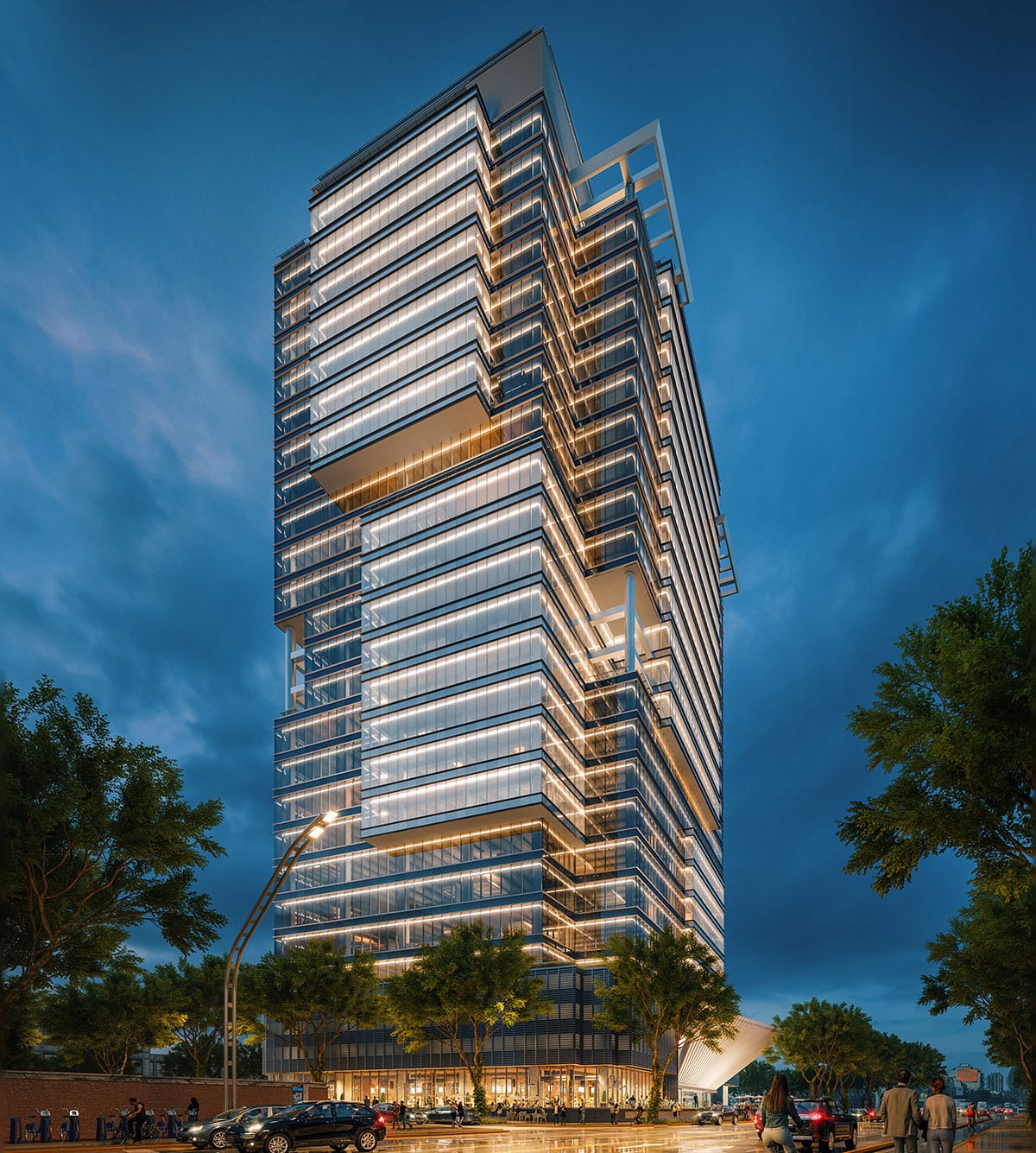 7Mil Libertador building lit up at night, showcasing its sleek glass architecture in Buenos Aires
